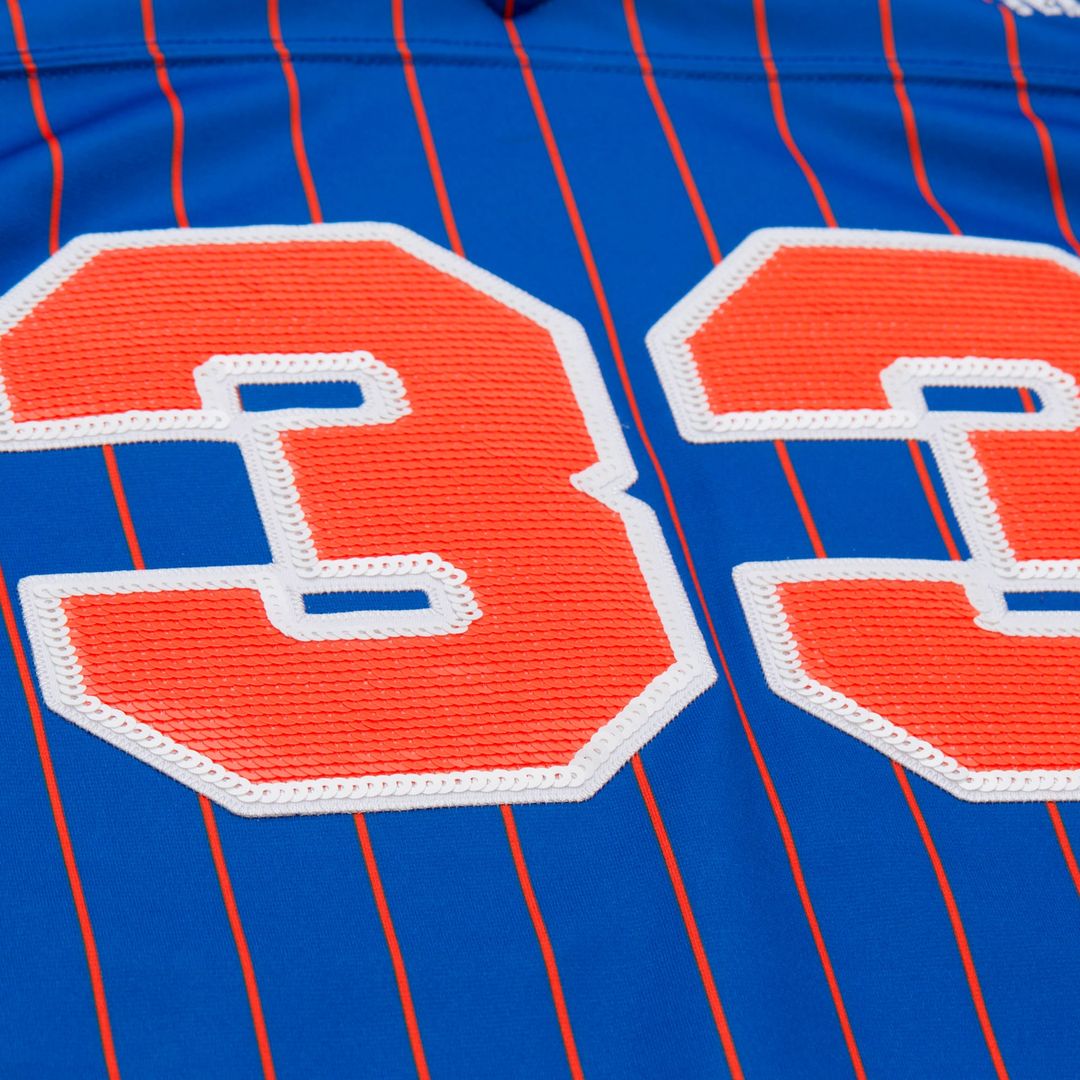New York Knicks Patrick Ewing Mitchell & Ness x DANNIJO Women's Name & Number Cropped Football Jersey - Blue Team Jersey Sports Fan Apparel