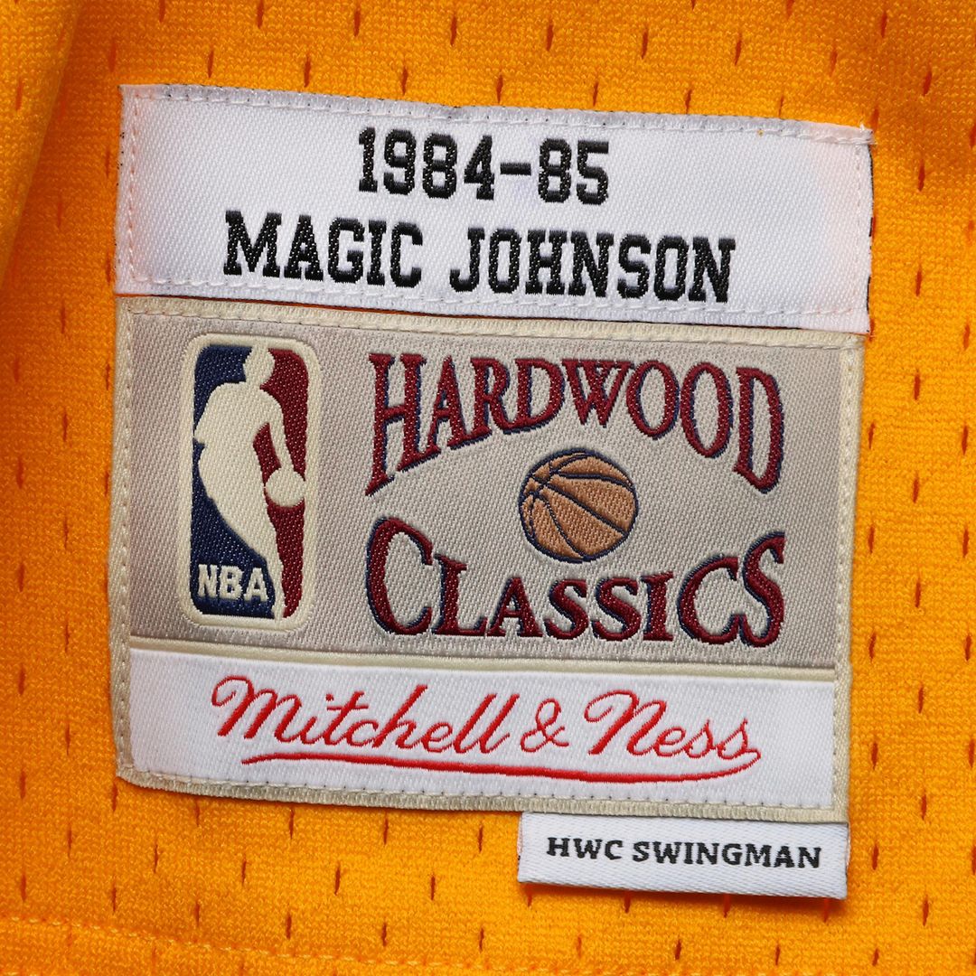 Los Angeles Lakers Magic Johnson Mitchell & Ness 1984/85 Hardwood Classics Swingman Jersey - Purple Team Jersey Sports Fan Apparel
